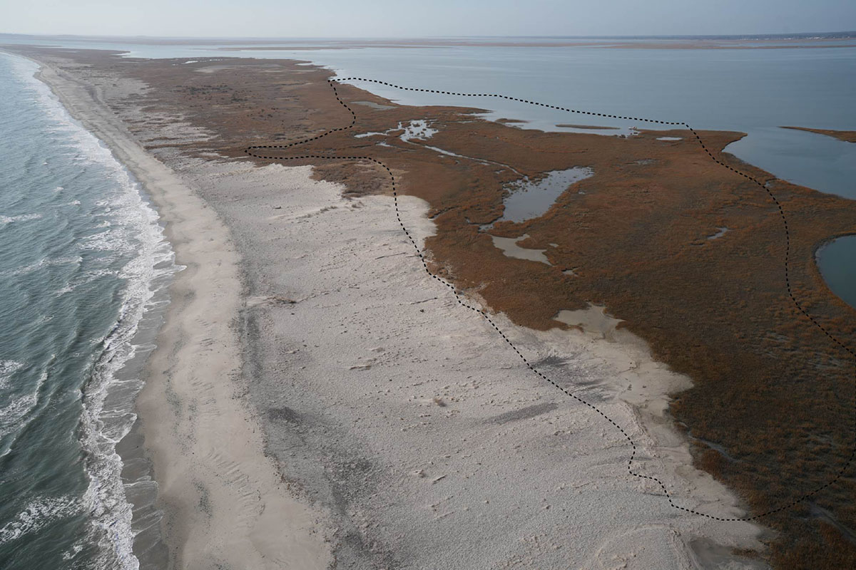 A drone photo of Cedar Island from January 2026 with the approximate location of the project site outlined. 