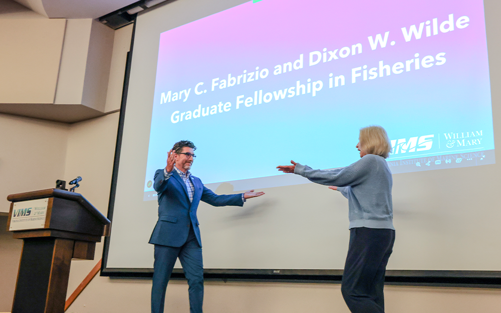 Batten School Dean and VIMS Director Derek Aday (left) and Mary Fabrizio (right) embrace while announcing the gift during the 2026 Batten School & VIMS Award Ceremony. Photo by Candace Johnson.