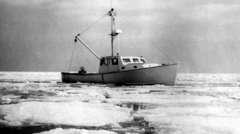 The VIMS research vessel {em}John Smith{/em} explores the ice-choked waters of the mid-Bay during the winter of 1978-79. © G. Thomas.