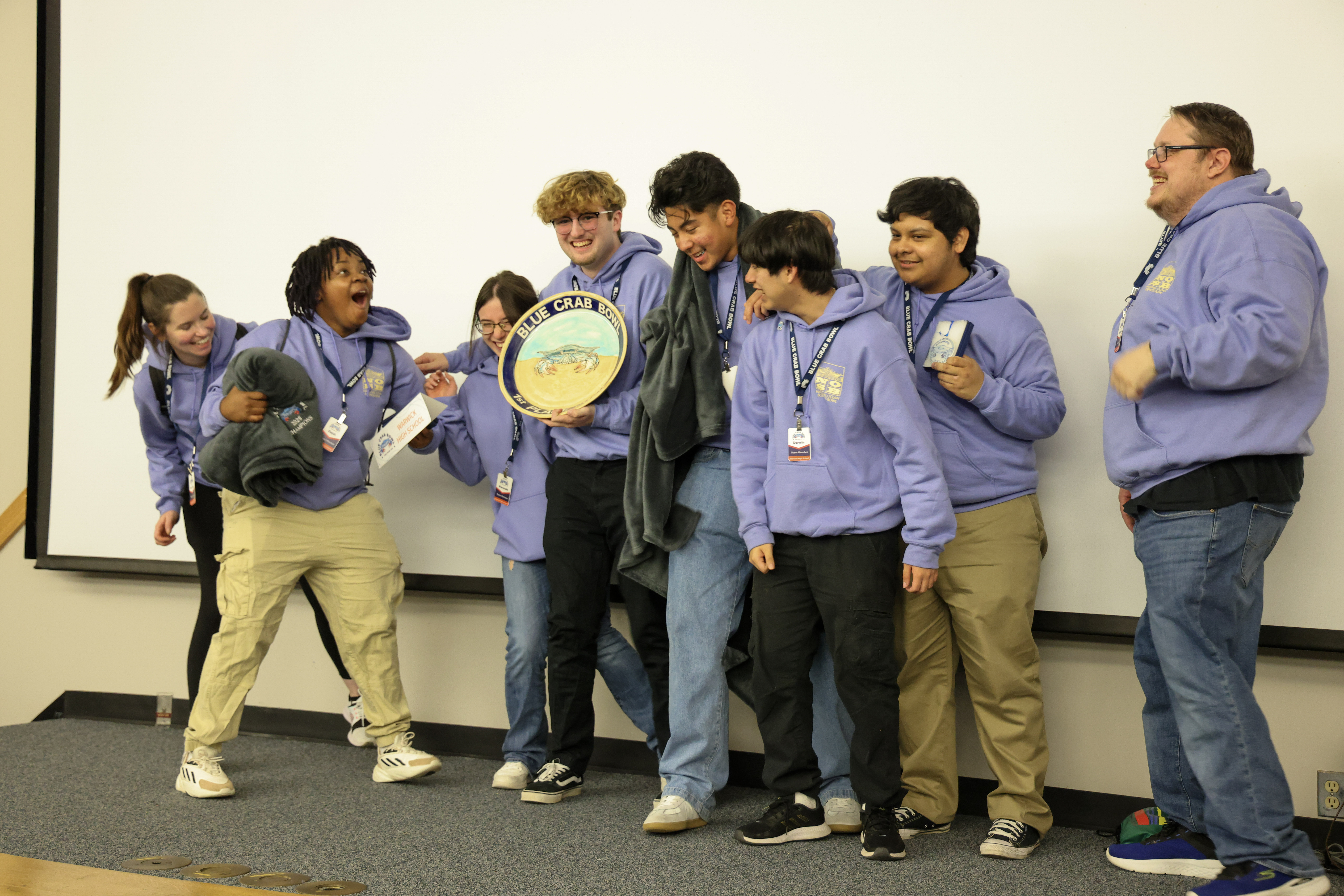 The Warwick High School team could hardly contain their excitement when accepting the award for 1st place in the 27th annual Blue Crab Bowl.