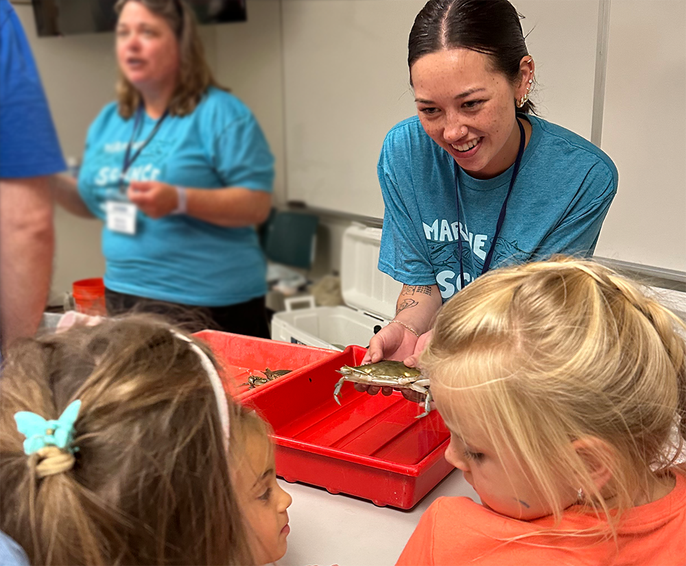 Elena Hoang was one of many Batten School students inspiring attendees with hands-on learning. Photo credit: Ethan Smith.