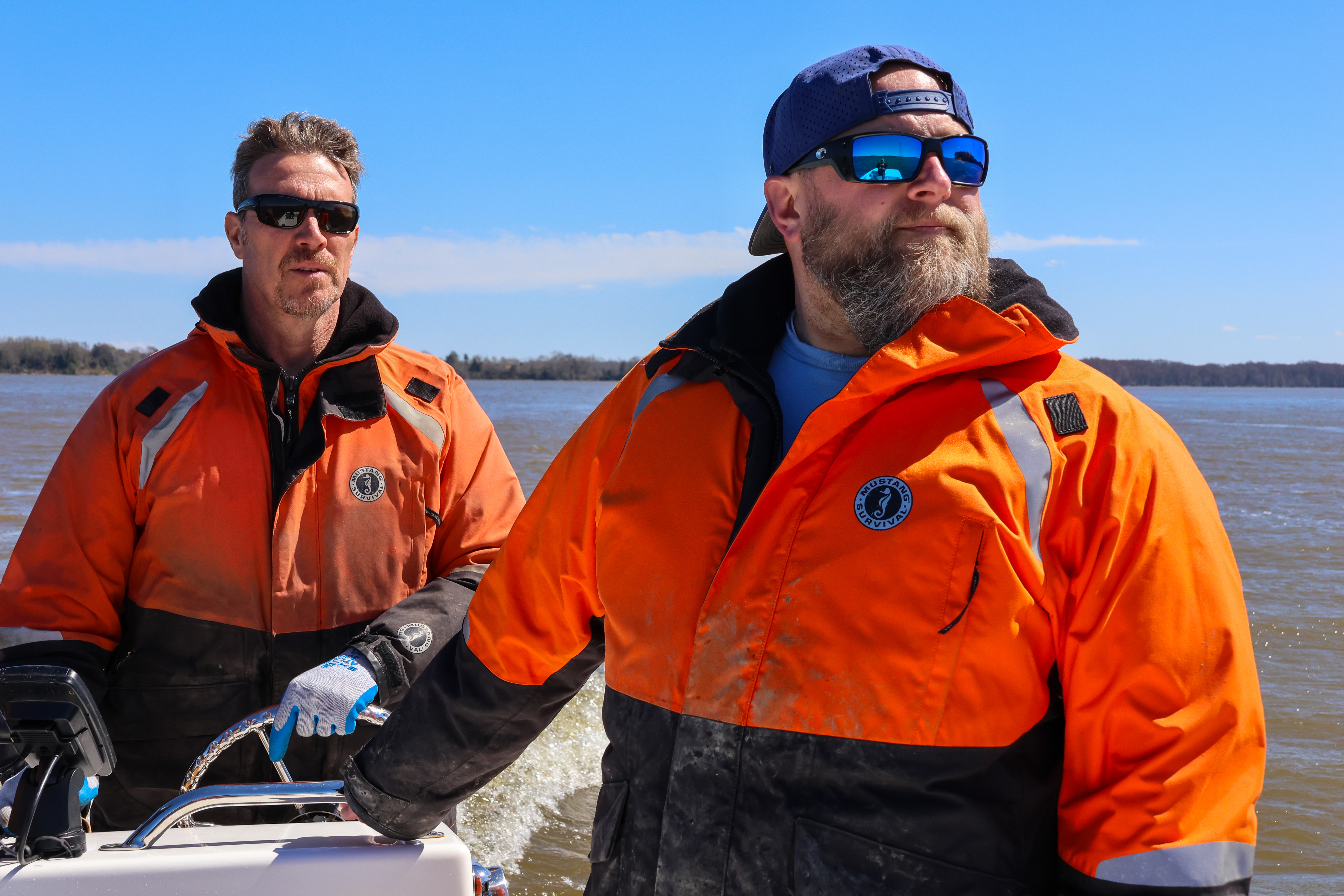 Jameson Gregg leads Multispecies Fisheries Group members toward next spawning survey location alongside Gregg Mears. Photo by John Wallace.