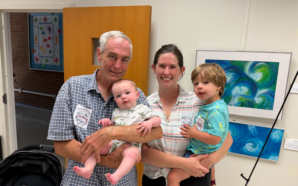 Marine Science Day is a family affair for James Bygert (left); his daughter, Stephanie Molloy (right); and her two children. Photo by Ethan Smith.