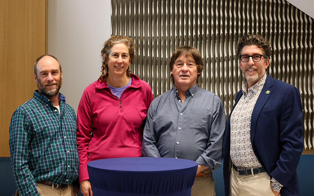 A recent reception celebrated Mark Luckenbach's many years of service to the Batten School & VIMS. From left to right: David Rudders, Megan La Peyre, Mark Luckenbach and Derek Aday. Photo by Candace Johnson.