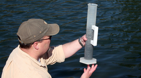 Hank Brooks of the American Eel Monitoring Program at VIMS subsamples glass eels at Wormley Creek,