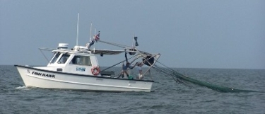 The survey's last vessel, the "R/V Fish Hawk", underway.