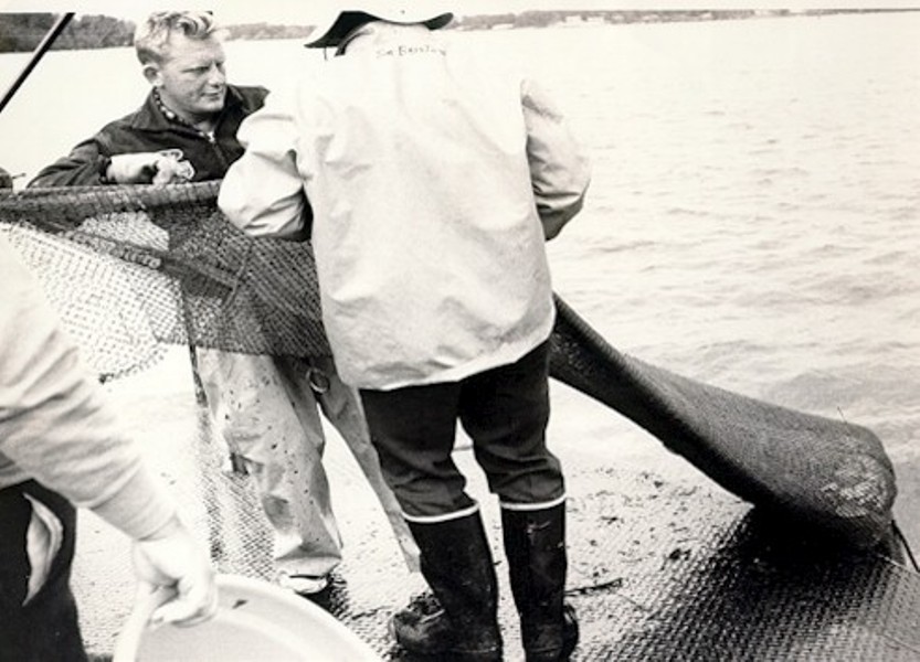 Scientists retrieving the trawl net after a tow